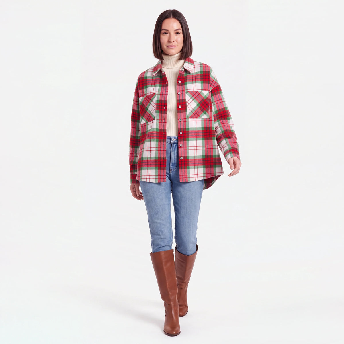 Woman walking in the Red Plaid flannel shacket worn open over a turtleneck