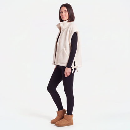 Oversized Sherpa Vest, Cream, side view with the side slit and bow