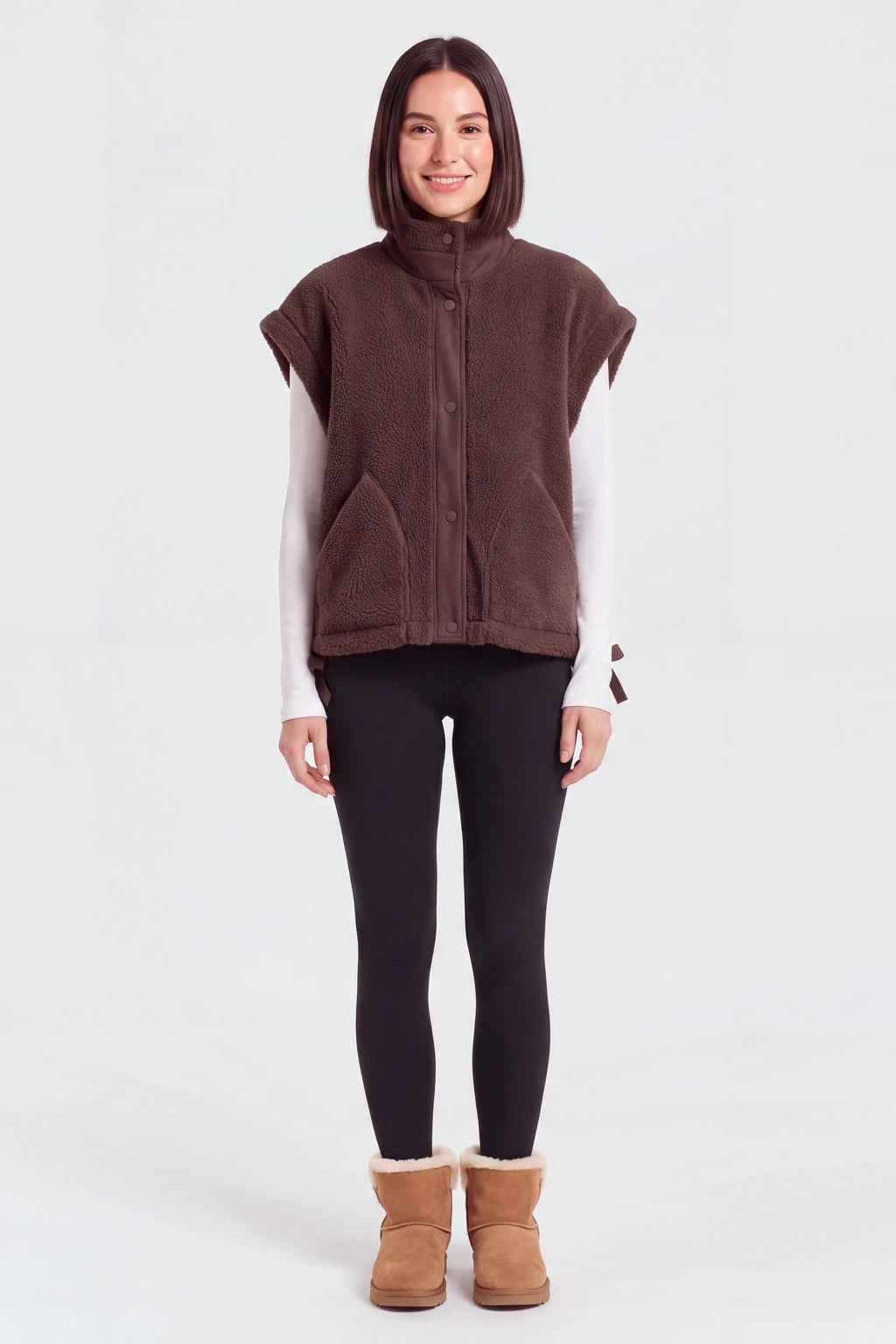 Woman wearing the oversized sherpa vest